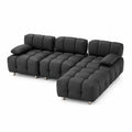 Sofá modular chaise longue de tela negra con cojines